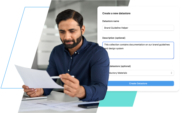 A man in a blue collared shirt is reviewing documents at a desk, with a digital interface overlay showing a form to create a new datastore. The form includes fields for 'Datastore name', 'Description (optional)', and 'Datastore (optional)', with a 'Create Datastore' button at the bottom. The datastore name is filled in as 'Brand Guideline Helper' and the description as 'This collection contains documentation and assets for our design system'.